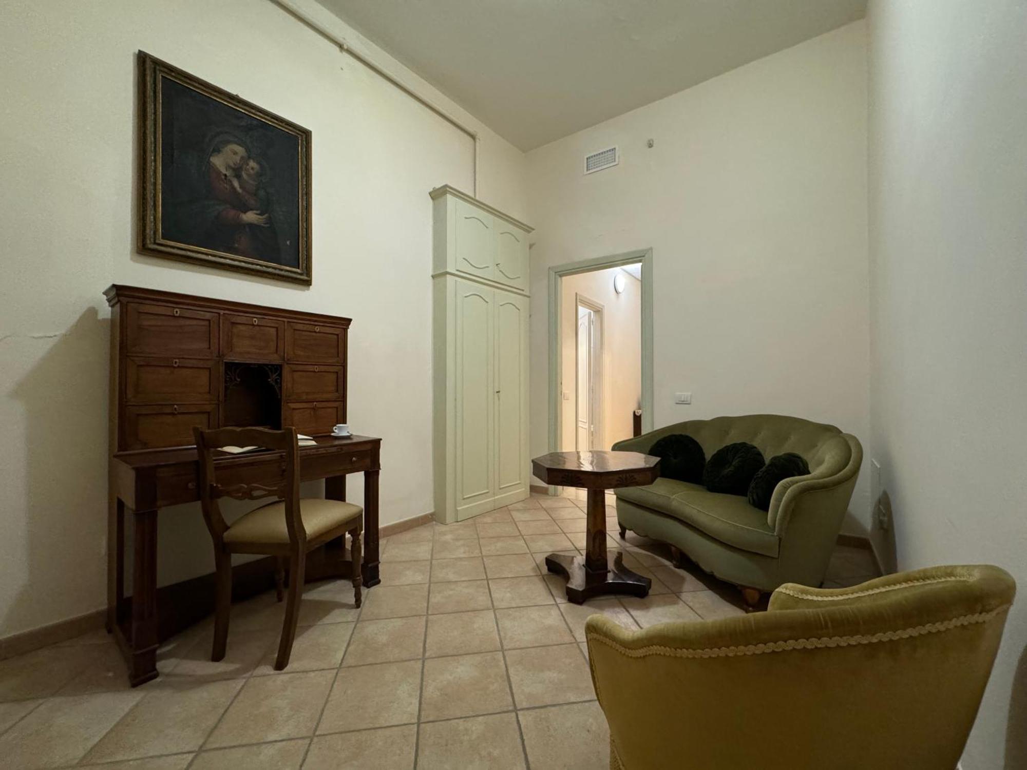 Monastero Ss. Annunziata Todi Exterior foto The living room of the apartment
