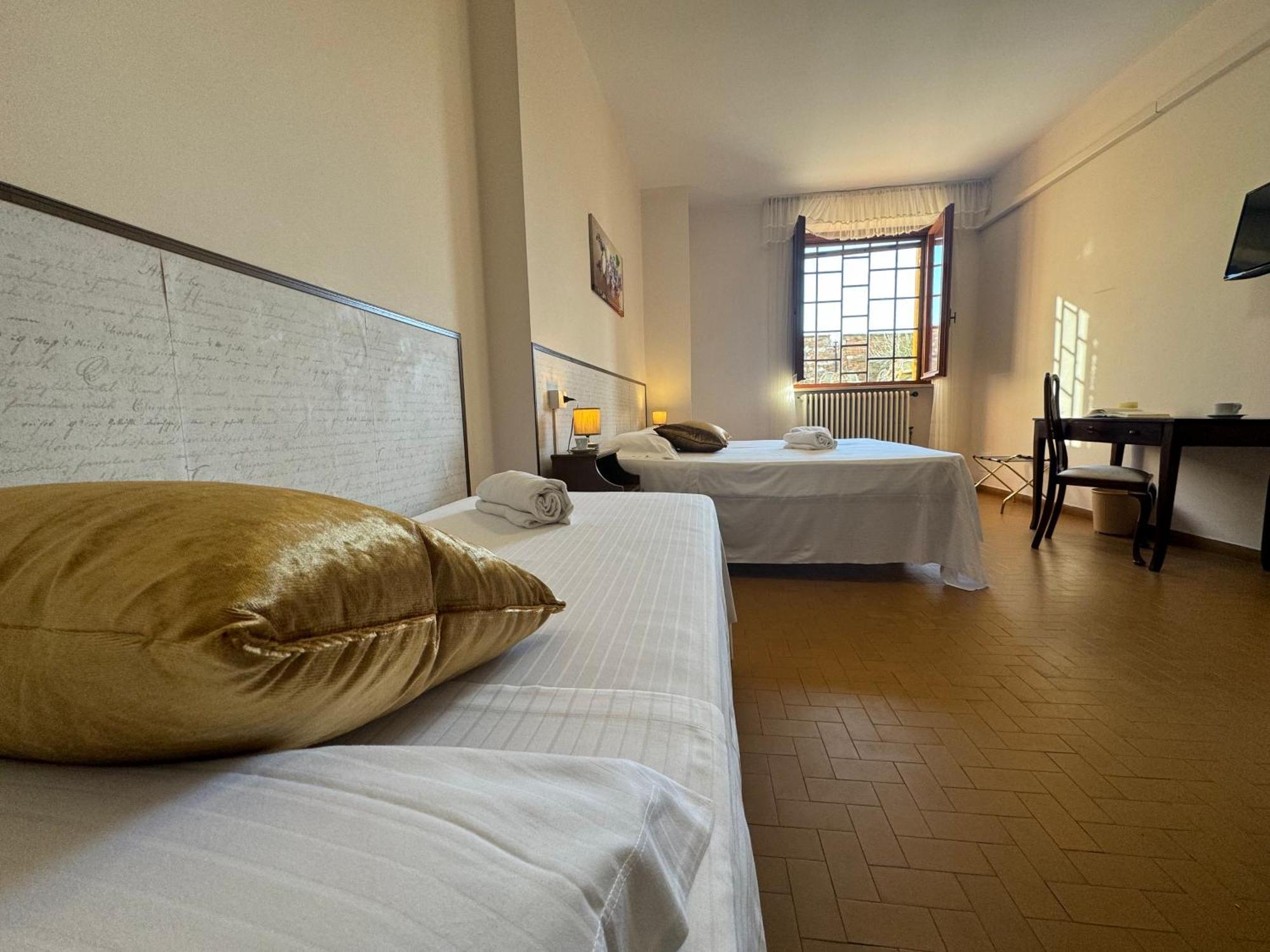 Monastero Ss. Annunziata Todi Quarto foto A room at the hotel