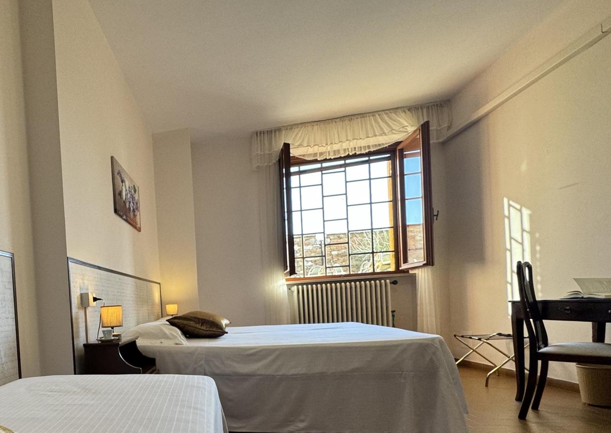 Monastero Ss. Annunziata Todi Quarto foto A room at the hotel