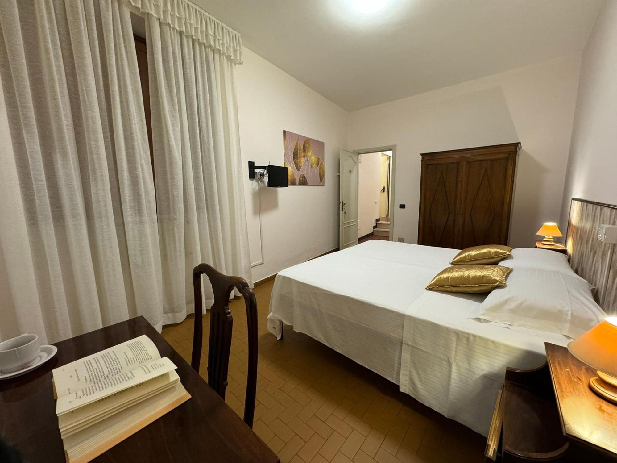 Monastero Ss. Annunziata Todi Quarto foto A bedroom in Italy
