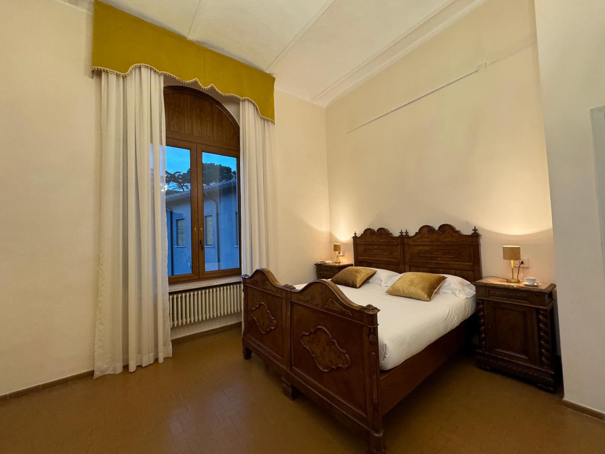 Monastero Ss. Annunziata Todi Exterior foto A room at the hotel
